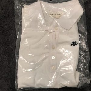 Two white polo size small. See picture.